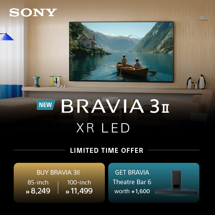 Sony BRAVIA 3II XR LED TV advertisement showing a large 85-inch and 100-inch wall-mounted television in a modern living room setting. The TV displays a scenic lake and mountain landscape with a boat.